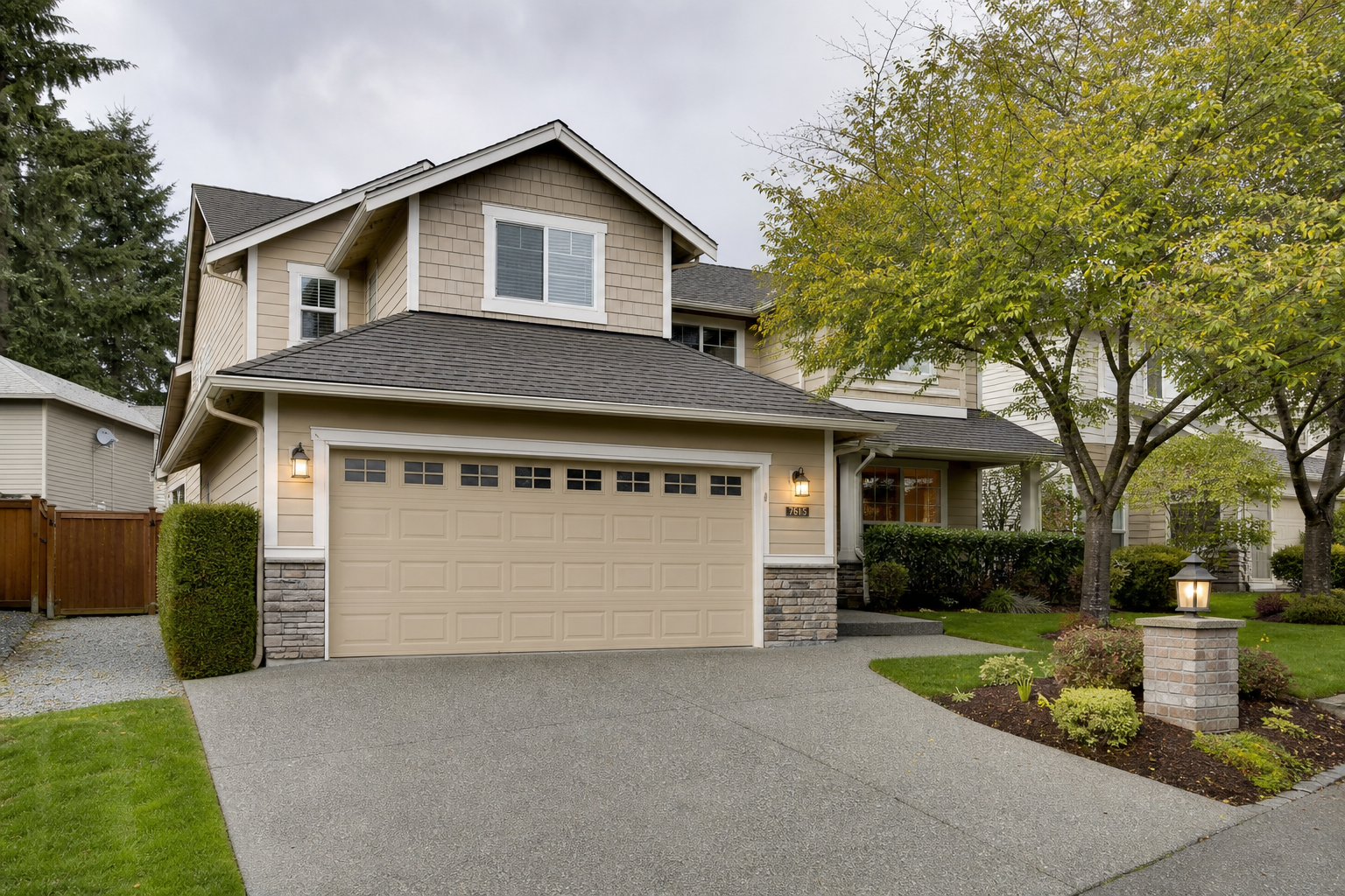 Suburban home in Mukilteo with a visible garage door and overcast daylight